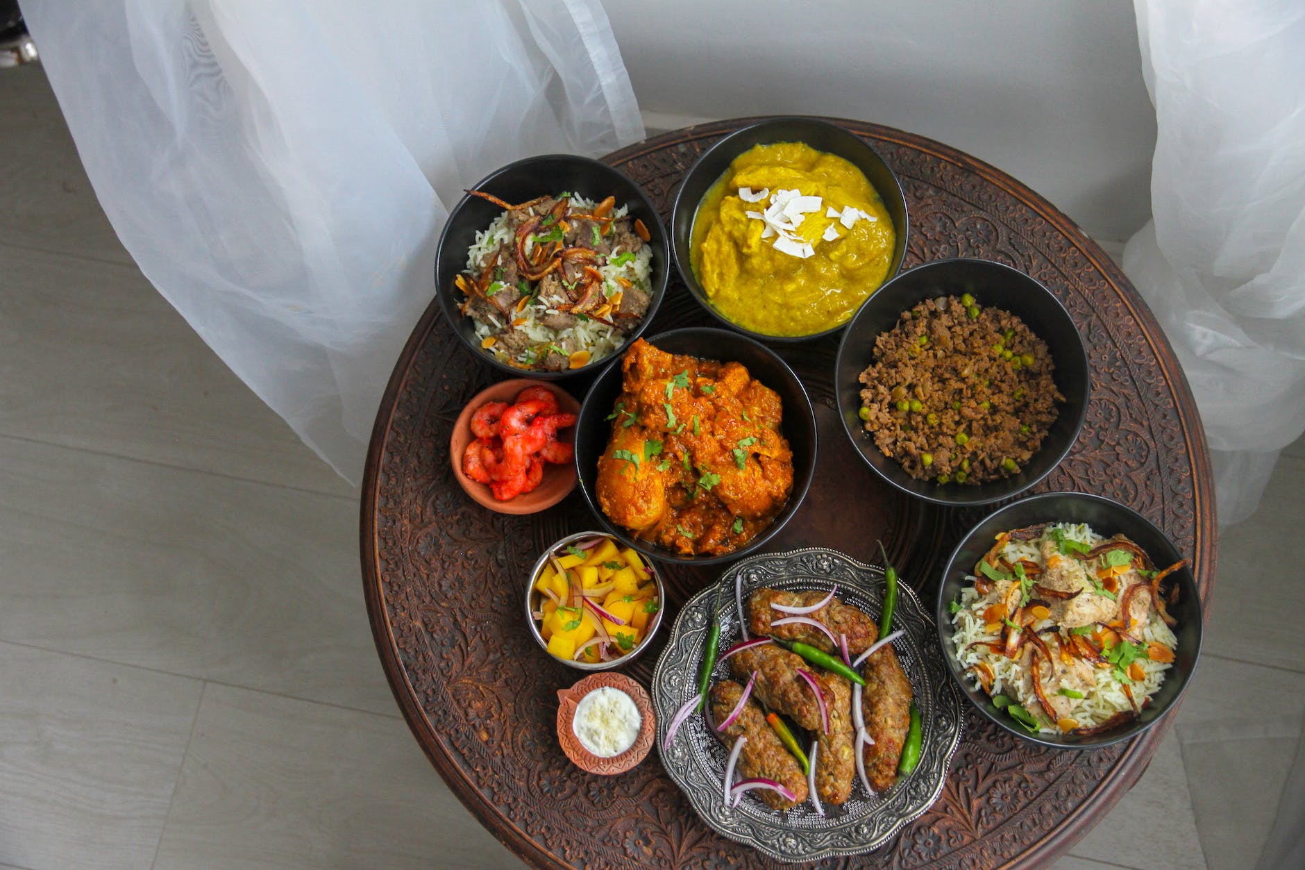 cooked food in a bowl on the round table